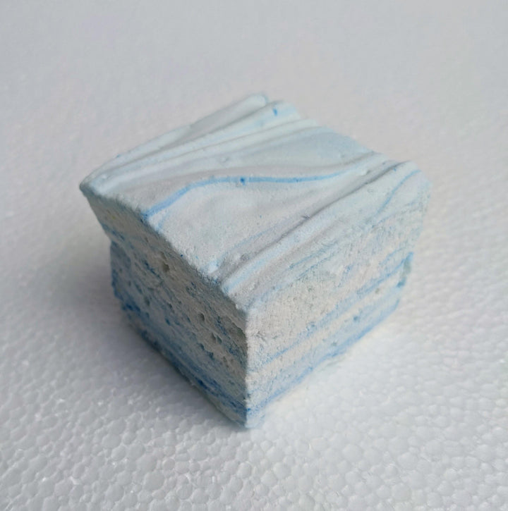 One Gourmet Handcrafted Junket with Blueberries Marshmallow on a white background