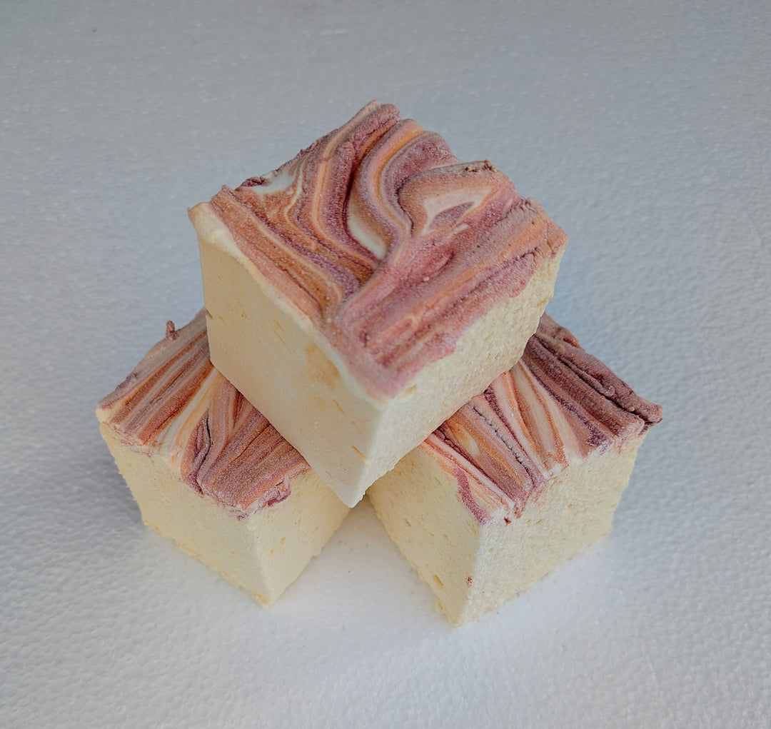 Light yellow marshmallows decorated with seasonal red and orange swirls, made without corn syrup and blended with invert syrup, cream of tartar, and gluten‑free corn starch.