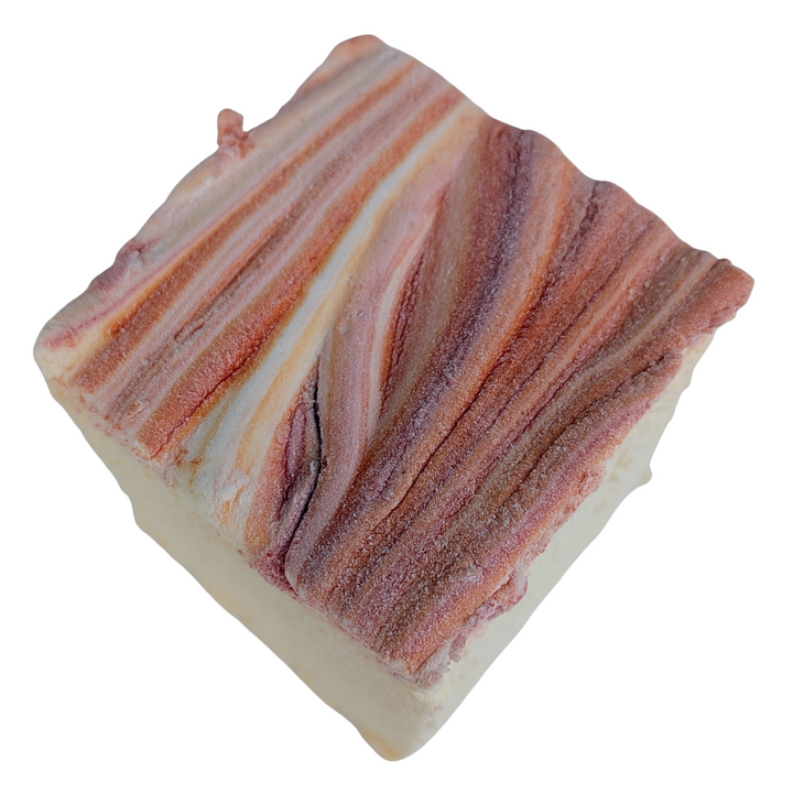 Light yellow gourmet marshmallows topped with red and orange autumn swirls, handcrafted with organic marshmallow root, natural colors, and gluten‑free ingredients.