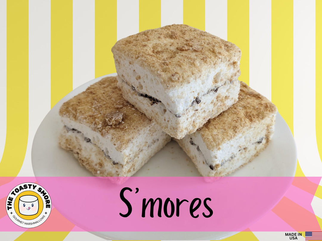 A plate of delicious s'mores stacked in a tempting display. Each s'more consists of a perfectly toasted marshmallow, slightly melted between layers of gooey chocolate and crisp graham crackers. The marshmallows are golden brown, and the chocolate is beginning to melt, creating a mouthwatering combination. The plate is set against a yellow and white striped background, evoking a cozy candy store atmosphere.