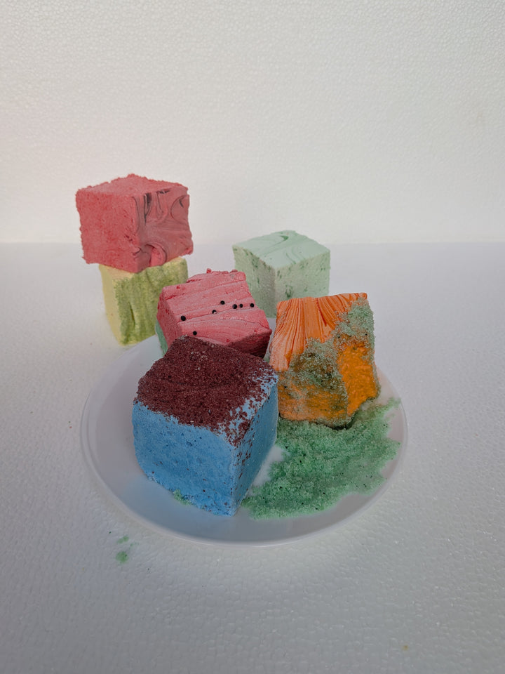 Colorful sour marshmallow bundle of six on a white surface