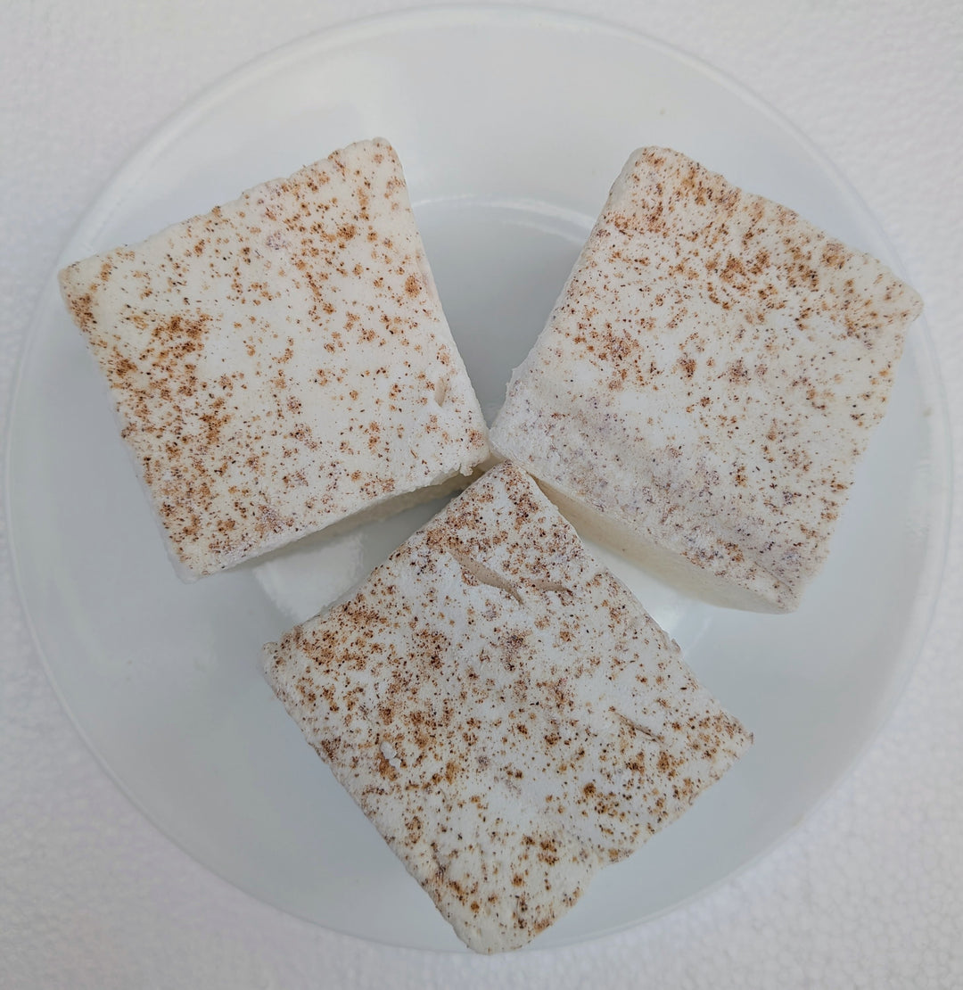 A trio of handmade horchata marshmallows showing natural creamy color and cinnamon dusting, crafted with beef gelatin and organic marshmallow root.