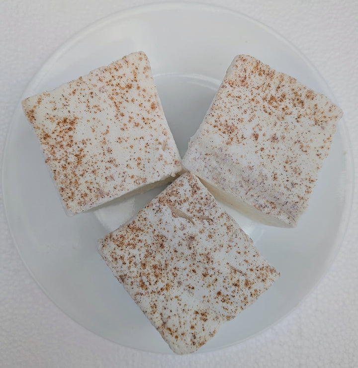A trio of handmade horchata marshmallows showing natural creamy color and cinnamon dusting, crafted with beef gelatin and organic marshmallow root.
