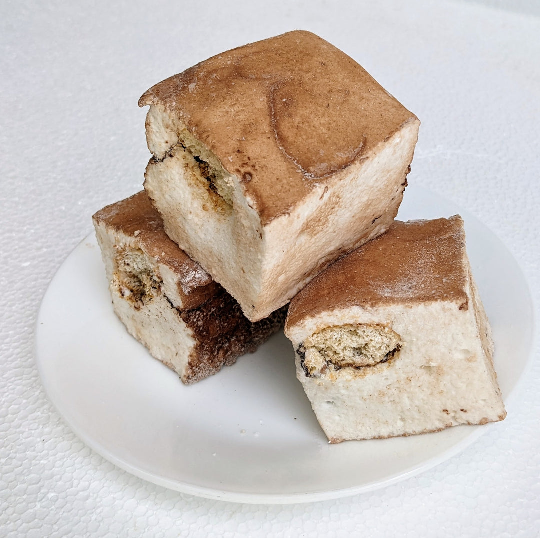 Premium handcrafted tiramisu marshmallows made in the USA, infused with bold espresso and coated in rich cocoa powder. These gourmet marshmallows offer a luxurious dessert experience, perfect for coffee lovers, artisanal sweet enthusiasts, and specialty gift seekers looking for indulgent treats.