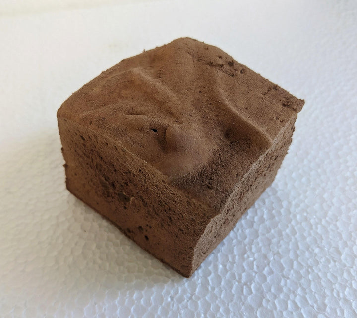 A single Hot chocolate marshmallow displayed on a clean, white background.
