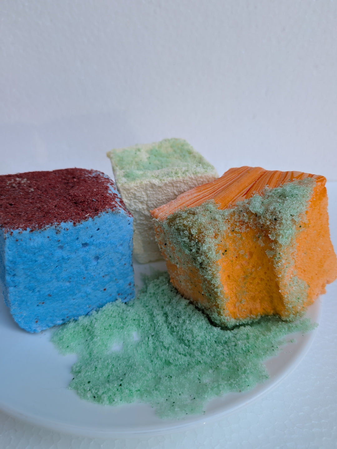 A bundle of six handcrafted sour marshmallows paired with vibrant sour dipping powder, displayed in colorful packaging with a playful, tart aesthetic.
