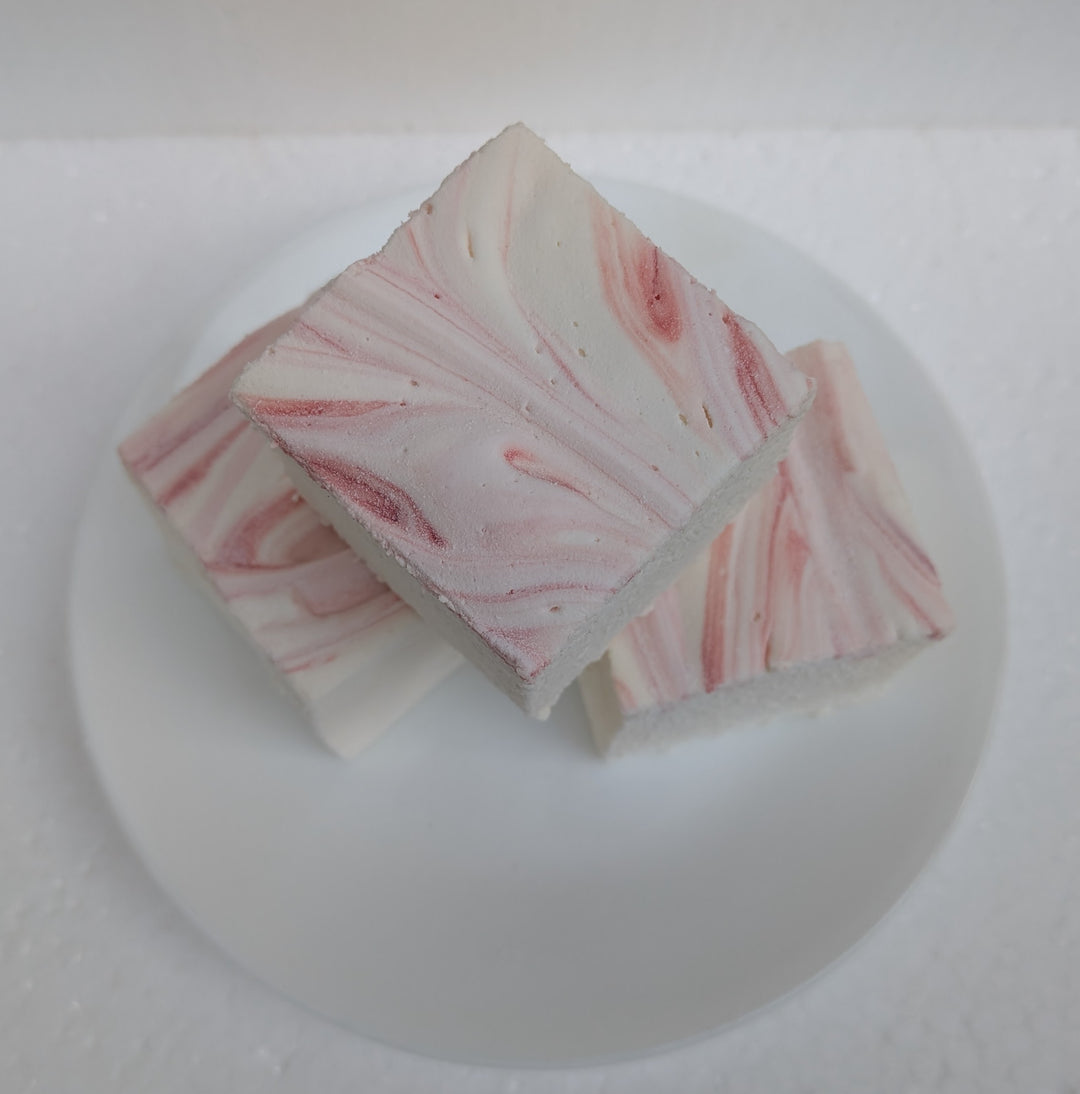 Strawberries and cream real marshmallows with natural pink and white swirls on a plate, made in the USA with Halal beef gelatin, organic marshmallow root, no corn syrup, and gluten‑free ingredients.