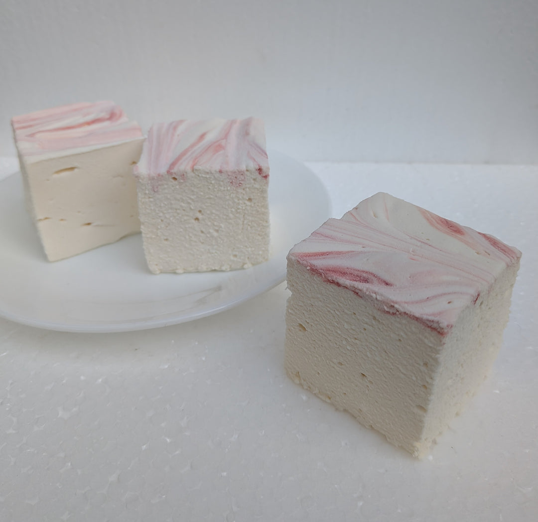 Strawberries and cream real marshmallows with natural pink and white swirls on a plate, handcrafted in the USA with Halal beef gelatin, organic marshmallow root, no corn syrup, and gluten‑free ingredients.