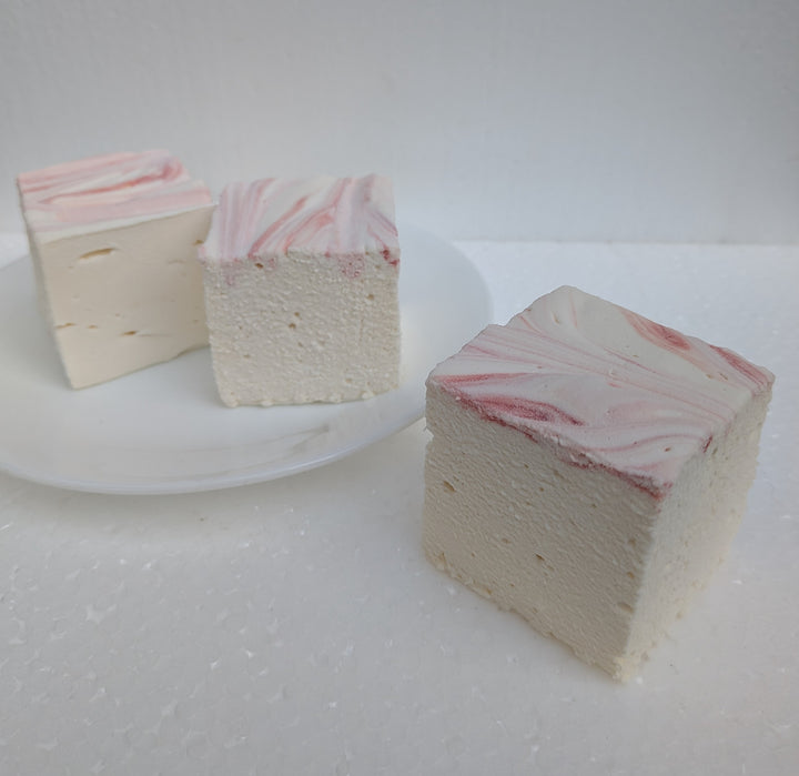 Strawberries and cream real marshmallows with natural pink and white swirls on a plate, handcrafted in the USA with Halal beef gelatin, organic marshmallow root, no corn syrup, and gluten‑free ingredients.