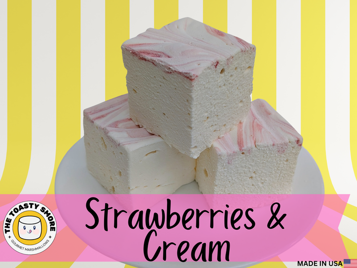 Strawberries and cream real marshmallows with pink and white swirls stacked on a plate, handcrafted with Halal beef gelatin and organic marshmallow root.
