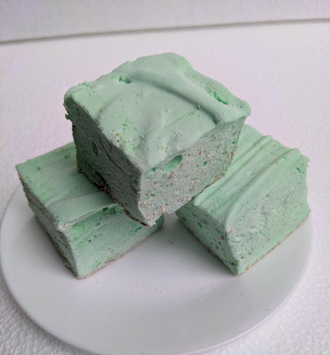 three key lime pie gourmet marshmallows on a white plate
