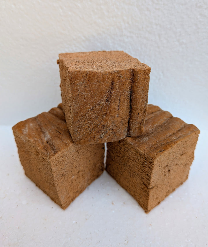 pumpkin spice gourmet marshmallows stacked on a white background
