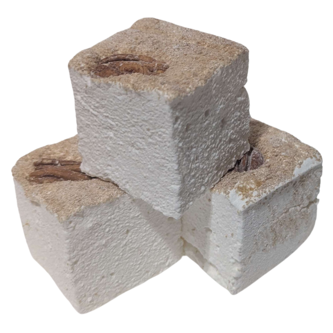 Three maple pecan pie gourmet marshmallows stacked on a white background