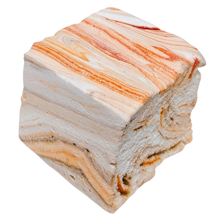Marble-like pumpkin chai gourmet marshmallowswith orange and beige patterns on a white background