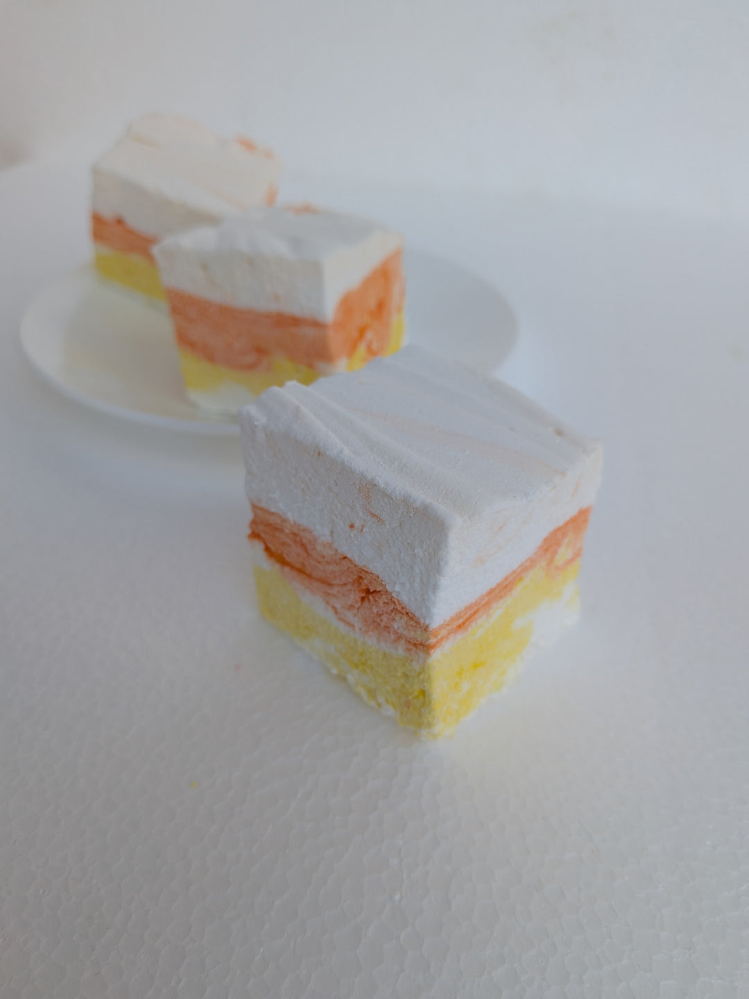 three pieces of gourmet marshmallows in candy corn 