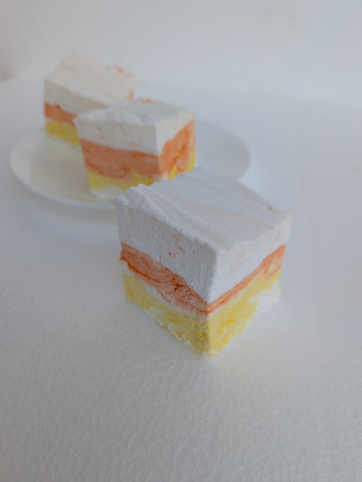 three pieces of gourmet marshmallows in candy corn 
